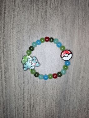 Handmade Bulbasaur Pokémon Bracelet – Beaded + Poké Ball Charm